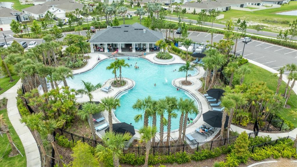 1680 Hazy Sea Drive Plant City, FL 33565 - Photo 43 of 49 an aerial view of a house with yard swimming pool and outdoor seating