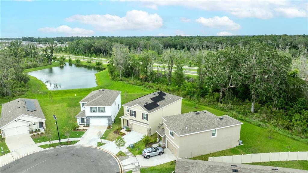 1680 Hazy Sea Drive Plant City, FL 33565 - Photo 49 of 49 an aerial view of a house with garden space and street view