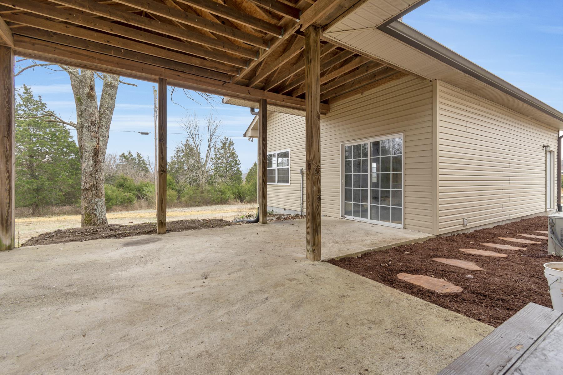 2825 Swindell Hollow Road Lebanon, TN 37090 - Photo 11 of 11 Big covered patio connecting the garage to the house.