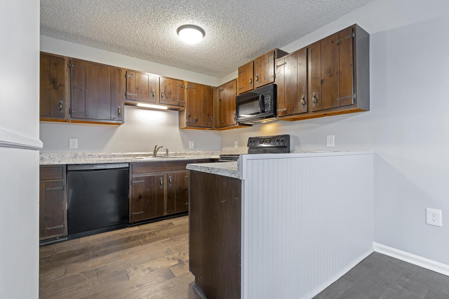 2825 Swindell Hollow Road Lebanon, TN 37090 - Photo 3 of 11 New counter tops and fixtures in the kitchen.