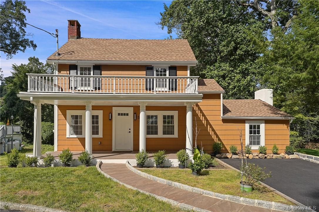 58 Whippoorwill Road East Armonk, NY 10504 - Photo 15 of 20 front view of a house with a yard