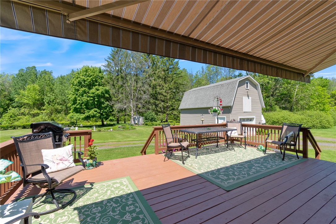 11805 Wilson Road Butler, NY 14590 - Photo 4 of 48 THE REAR DECK WITH RETRACTABLE AWNING! Check out t