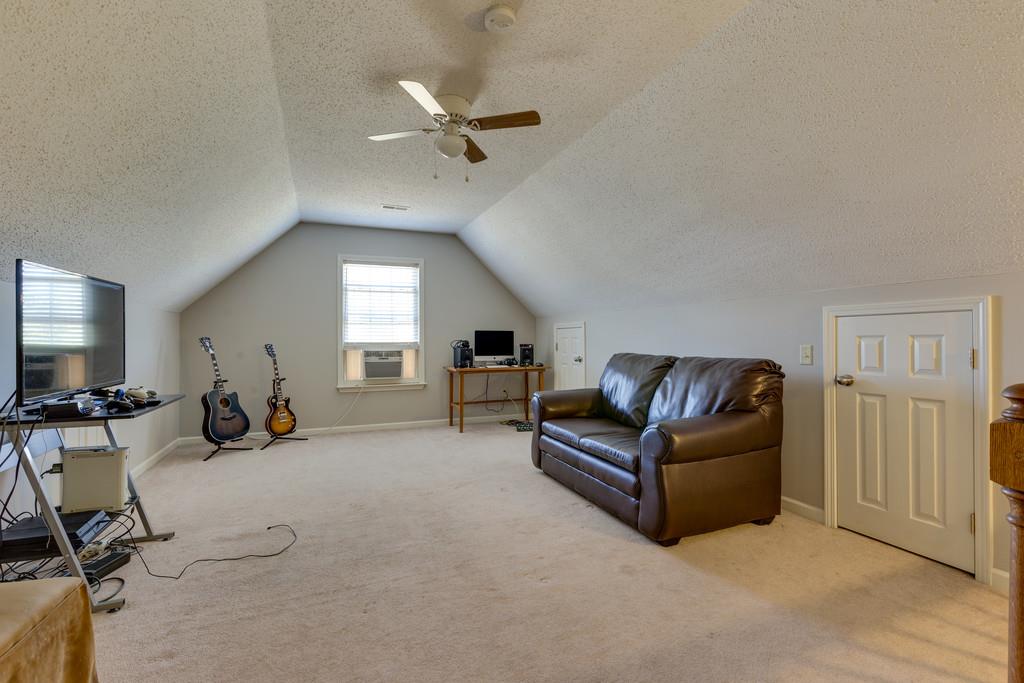 2105 Zion Road Columbia, TN 38401 - Photo 20 of 29 Huge bonus room that could be used for media or a 4th bedroom. It has a walk in closet.