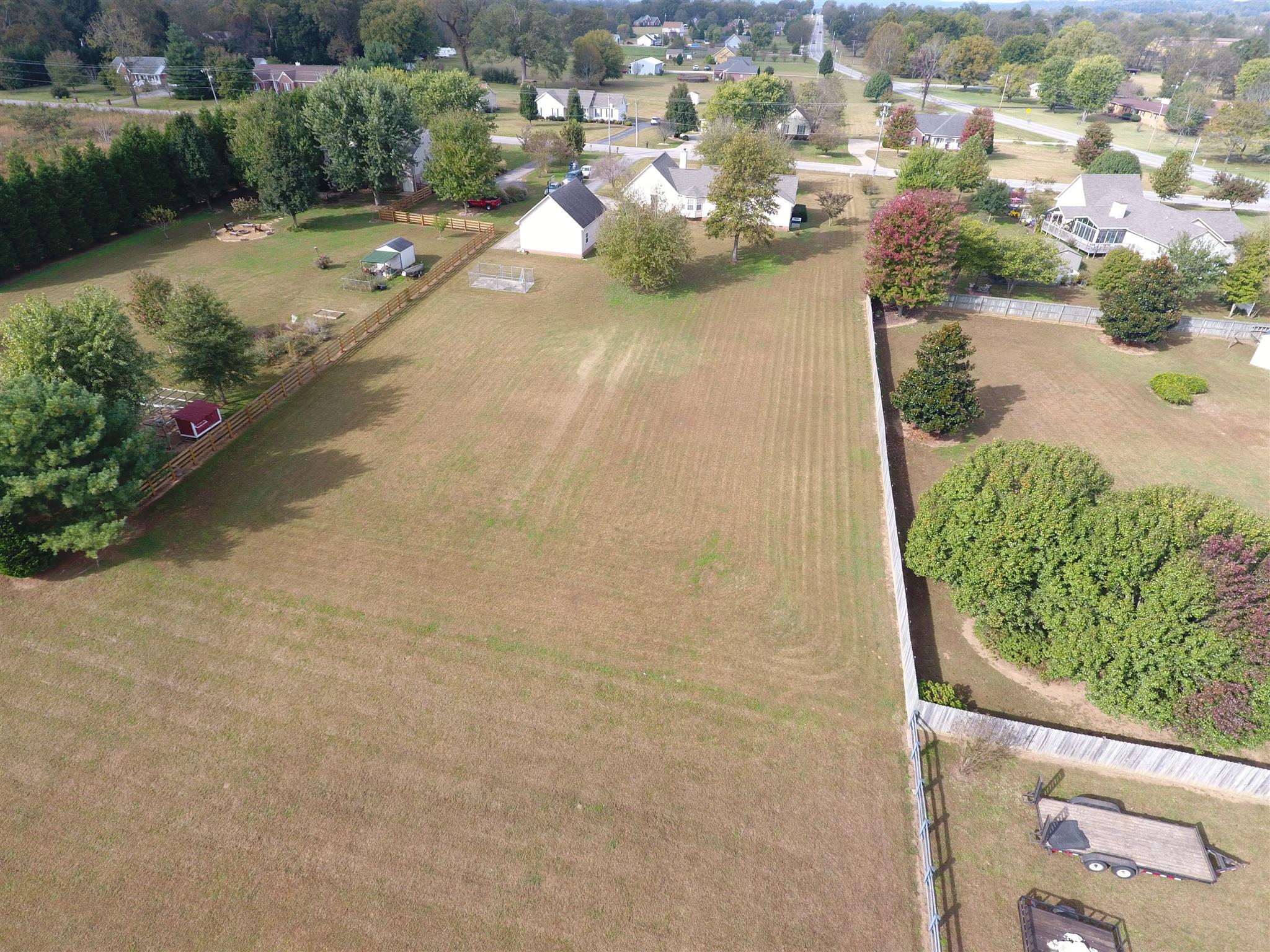2105 Zion Road Columbia, TN 38401 - Photo 28 of 29 Drone shot of the back of the property. It gives you a great perspective of how deep the property is. The property line ends at the privacy fence.