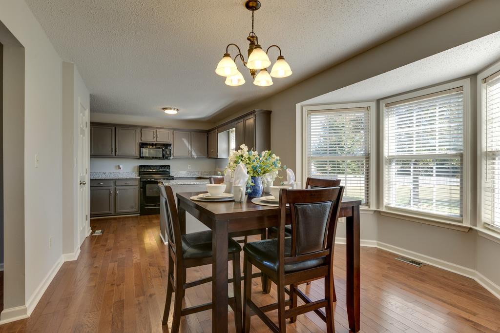 2105 Zion Road Columbia, TN 38401 - Photo 10 of 29 Dining room shares beautiful hardwood floors with kitchen.