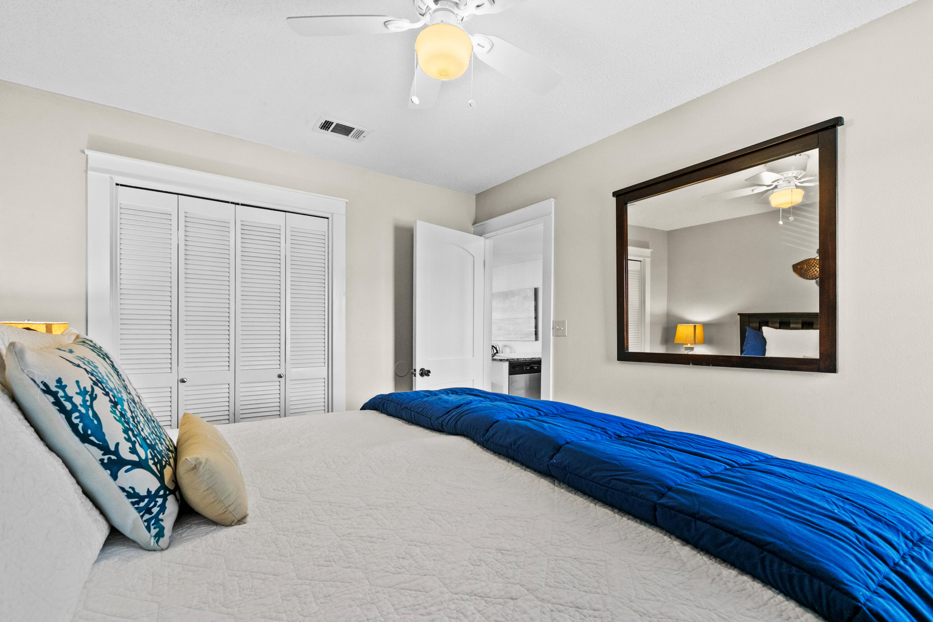 3799 East County Highway 30A, Unit F2 Santa Rosa Beach, FL 32459 - Photo 15 of 21 a bedroom with a bed and a painting on the wall