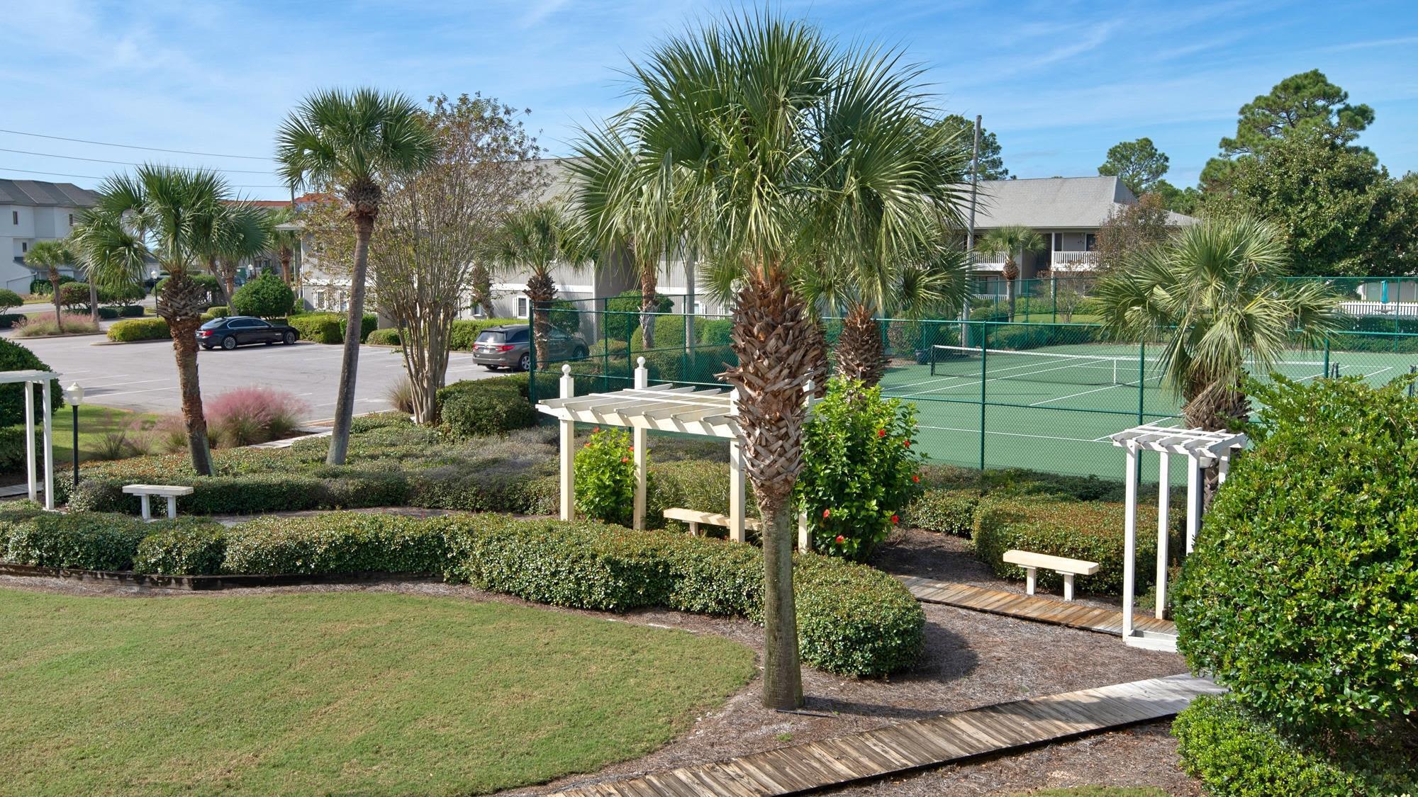 3799 East County Highway 30A, Unit F2 Santa Rosa Beach, FL 32459 - Photo 17 of 21 a view of backyard with swimming pool and green space