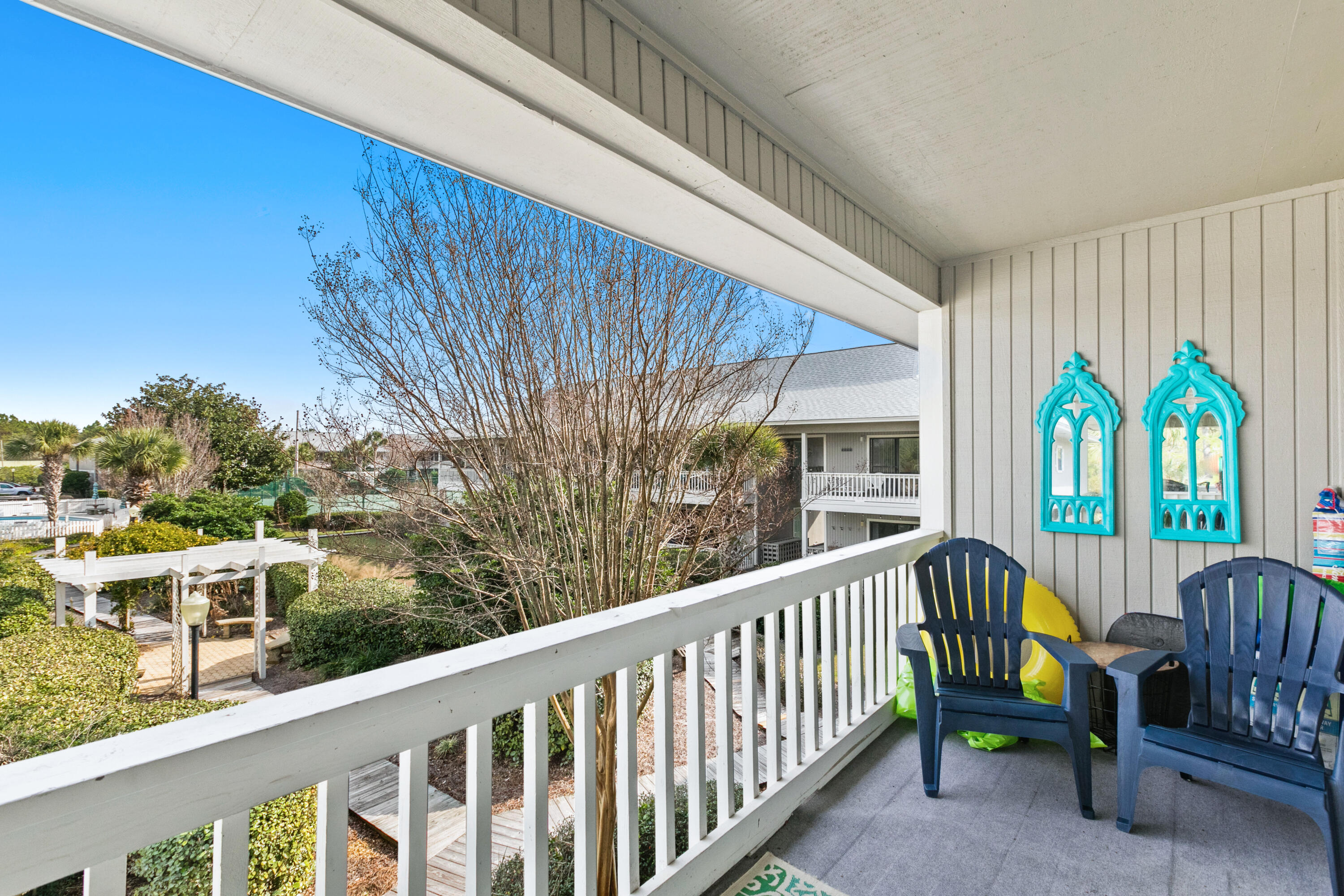 3799 East County Highway 30A, Unit F2 Santa Rosa Beach, FL 32459 - Photo 5 of 21 a view of a two chairs in the balcony