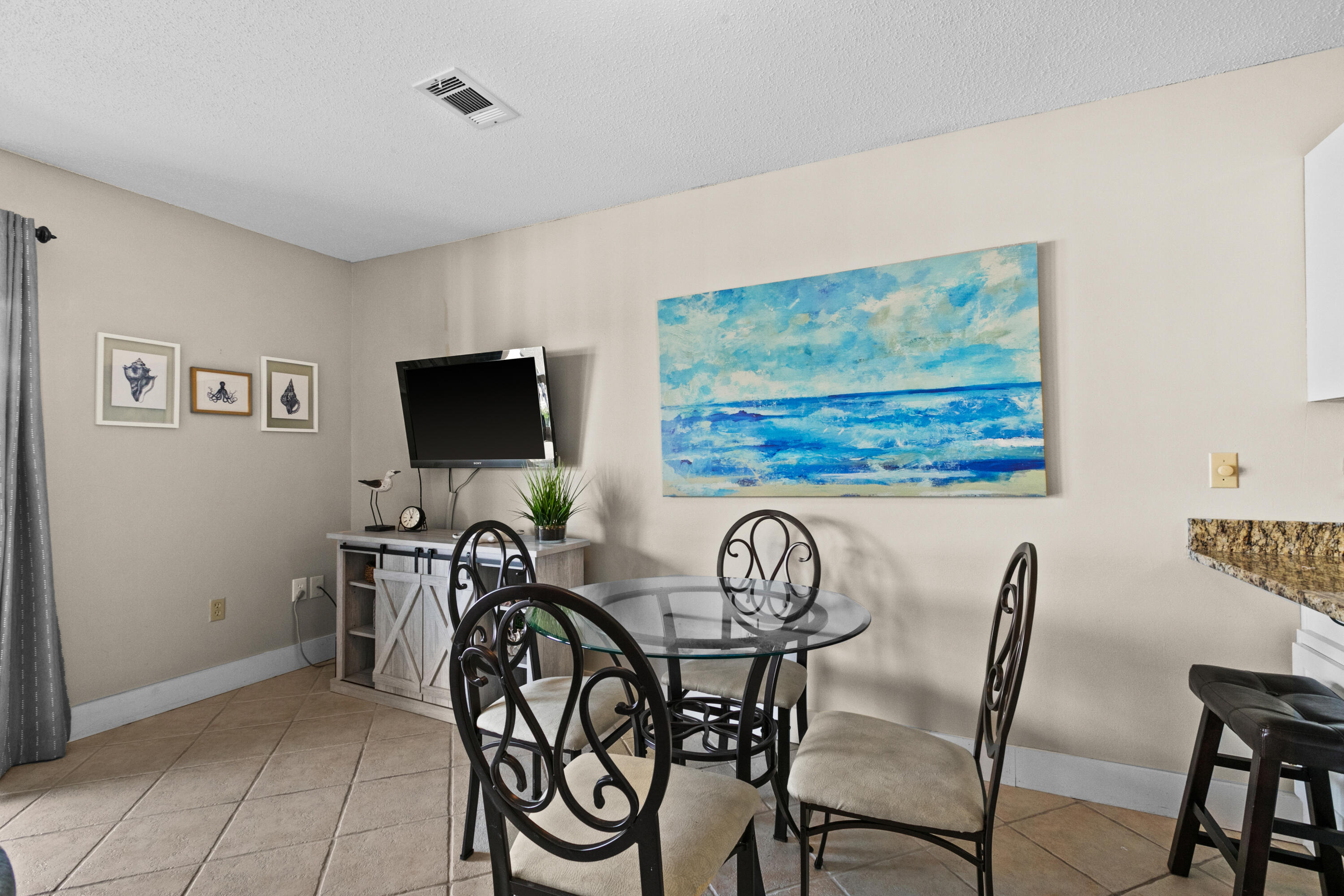 3799 East County Highway 30A, Unit F2 Santa Rosa Beach, FL 32459 - Photo 9 of 21 a view of a dining room with furniture window and outside view