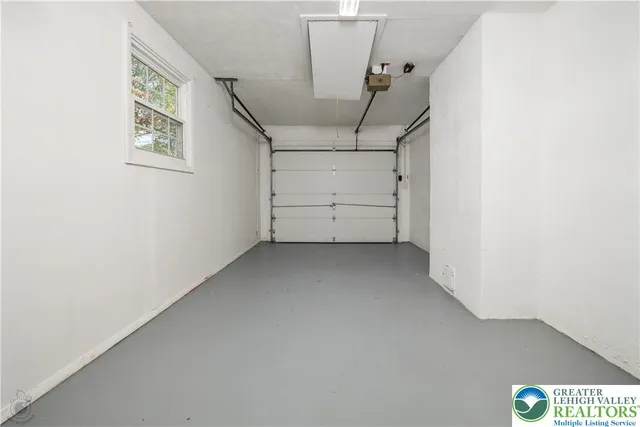 a view of room with stairs and window