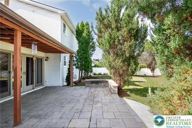 a view of a house with pathway