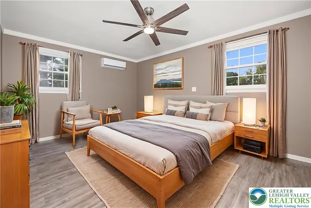 a bedroom with bed and window