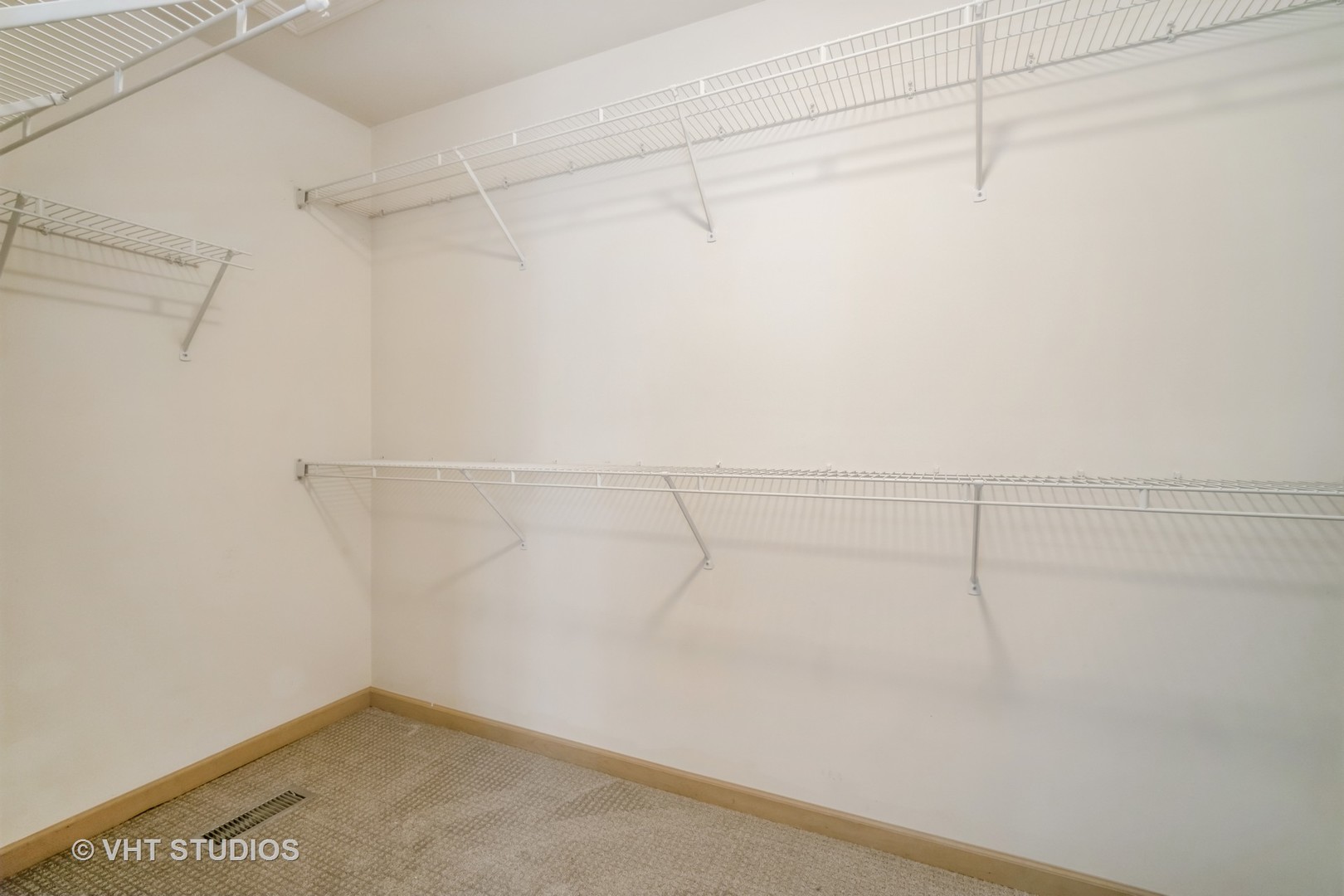 417 Locksley Drive Streamwood, IL 60107 - Photo 20 of 25 a view of a room with racks on the wall