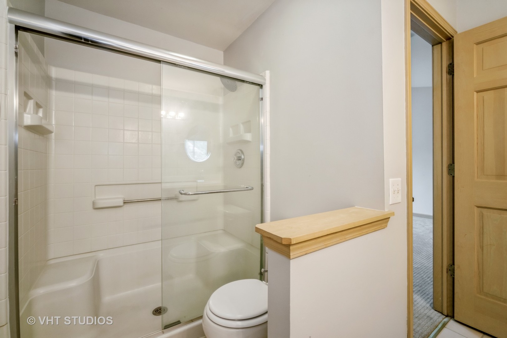 417 Locksley Drive Streamwood, IL 60107 - Photo 23 of 25 a bathroom with a shower a toilet and a sink