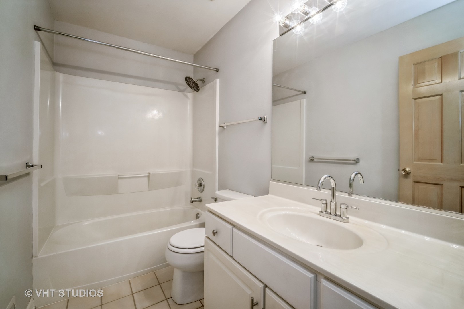 417 Locksley Drive Streamwood, IL 60107 - Photo 25 of 25 a bathroom with a sink toilet vanity and shower