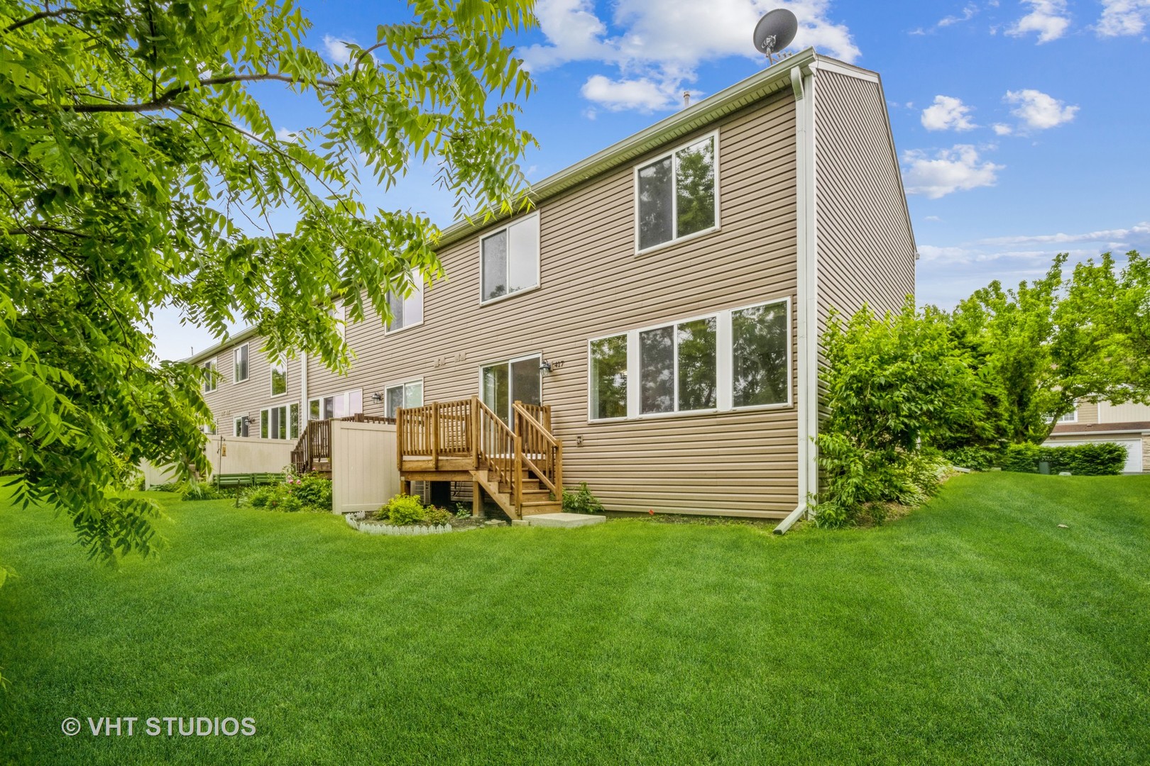 417 Locksley Drive Streamwood, IL 60107 - Photo 5 of 25 a view of a house with a backyard