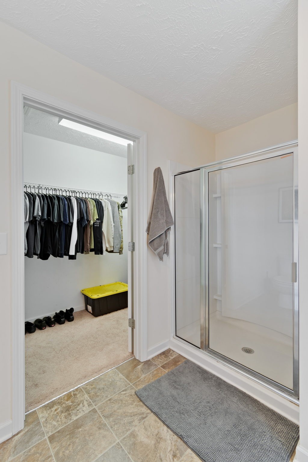 6045 Cane Springs Road Antioch, TN 37013 - Photo 12 of 23 a bathroom with a tub and shower