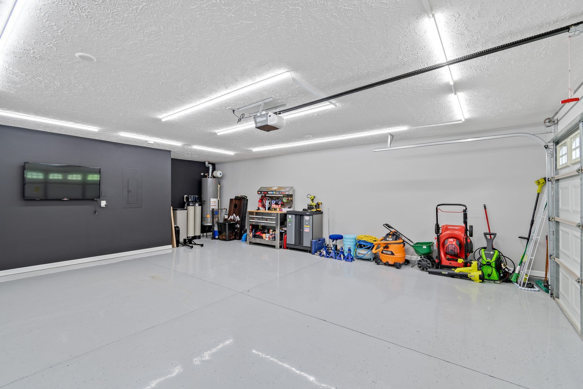 6045 Cane Springs Road Antioch, TN 37013 - Photo 17 of 23 a view of a garage with a bike and car