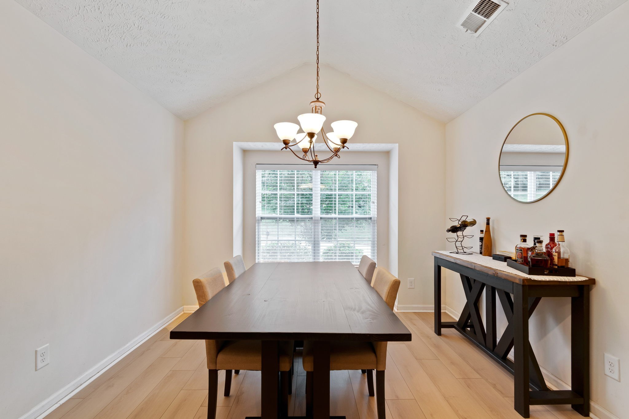 6045 Cane Springs Road Antioch, TN 37013 - Photo 2 of 23 a view of a dining room with furniture window and wooden floor
