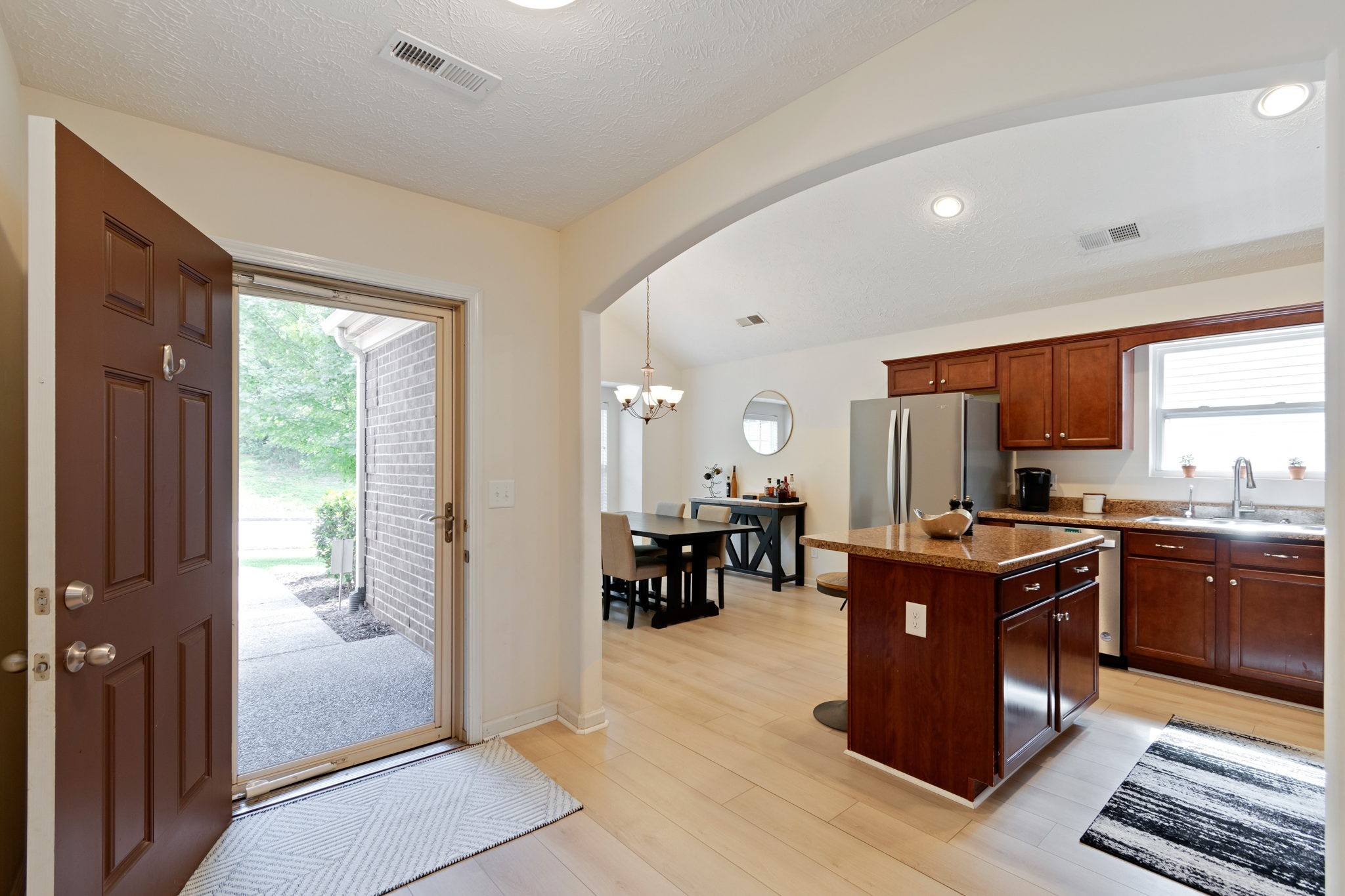 6045 Cane Springs Road Antioch, TN 37013 - Photo 5 of 23 a kitchen with stainless steel appliances granite countertop a stove and a refrigerator