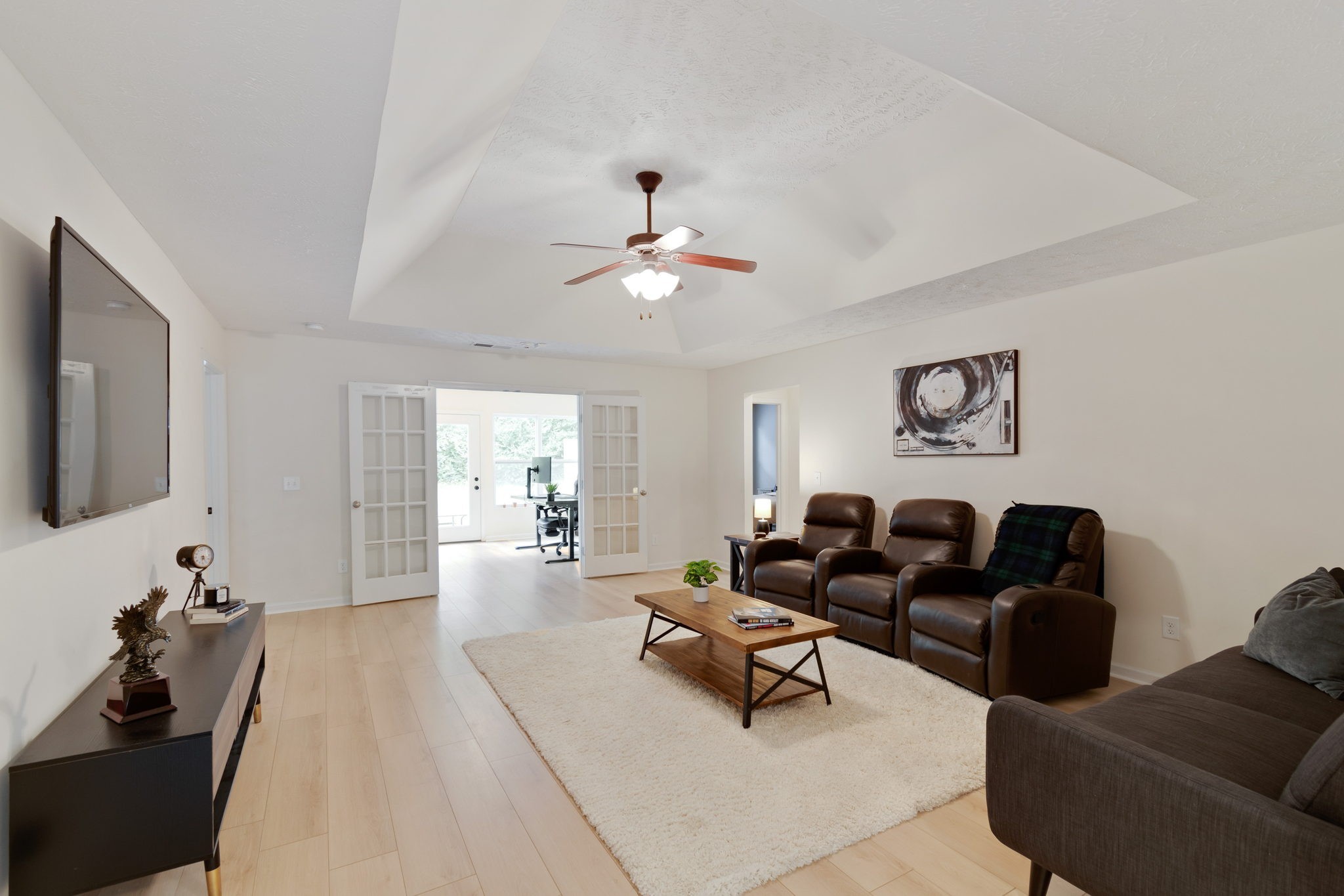 6045 Cane Springs Road Antioch, TN 37013 - Photo 6 of 23 a living room with furniture and a chandelier