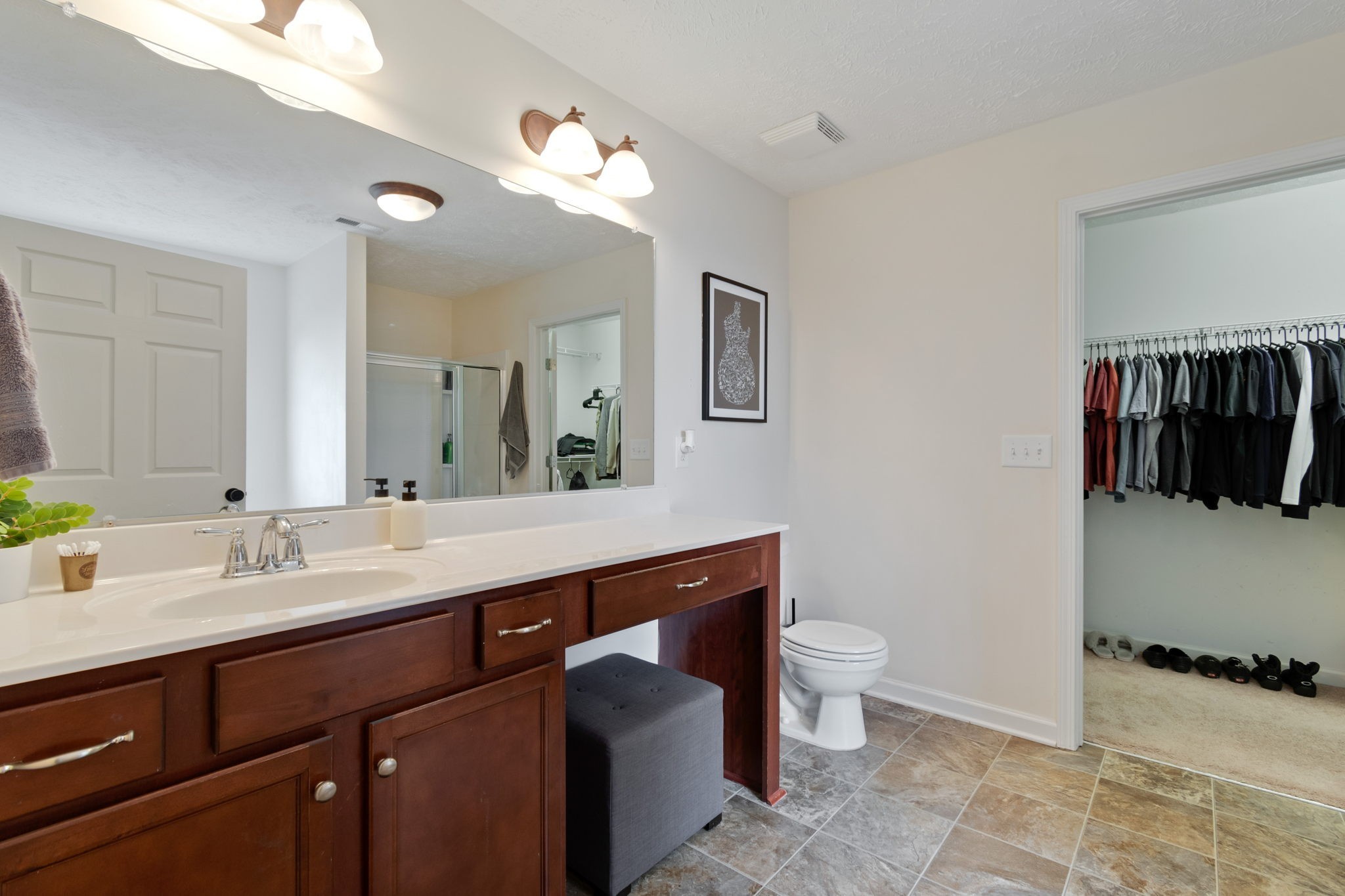 6045 Cane Springs Road Antioch, TN 37013 - Photo 10 of 23 a bathroom with a double vanity sink and a toilet