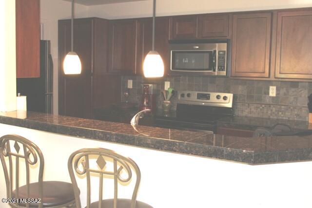 2016 East River Road, Unit 102 Tucson, AZ 85718 - Photo 5 of 14