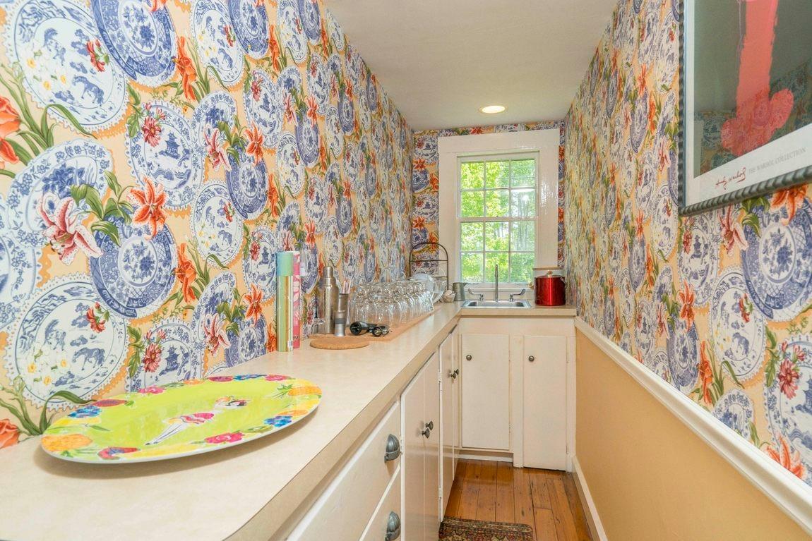 545 Old Harbor Road Chatham, MA 02633 - Photo 27 of 35 a bathroom with a sink and a mirror