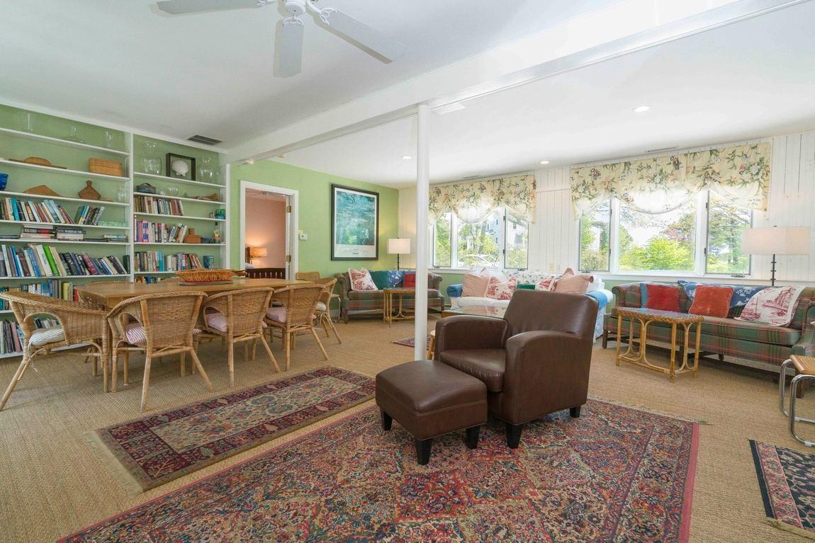 545 Old Harbor Road Chatham, MA 02633 - Photo 31 of 35 a living room with furniture and a large window