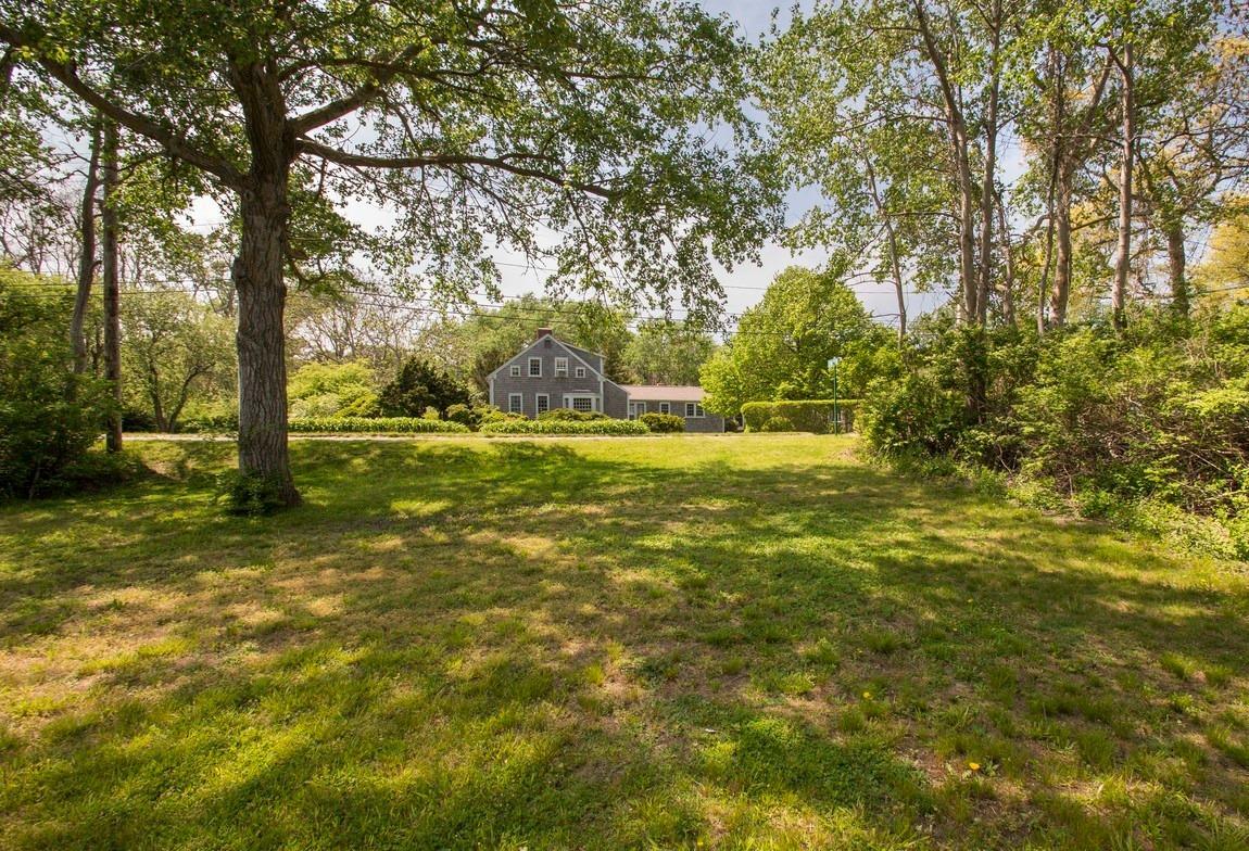 545 Old Harbor Road Chatham, MA 02633 - Photo 4 of 35 a view of outdoor space with deck and yard