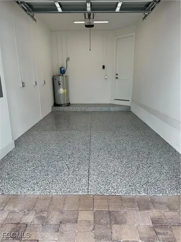 a view of a lake with tall buildings