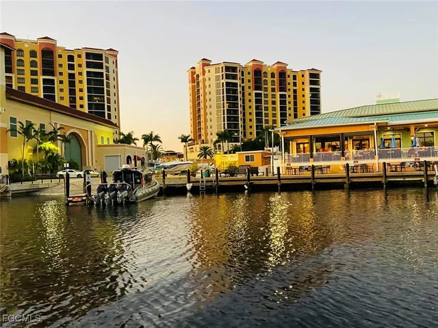 a group of people sitting outside of a building