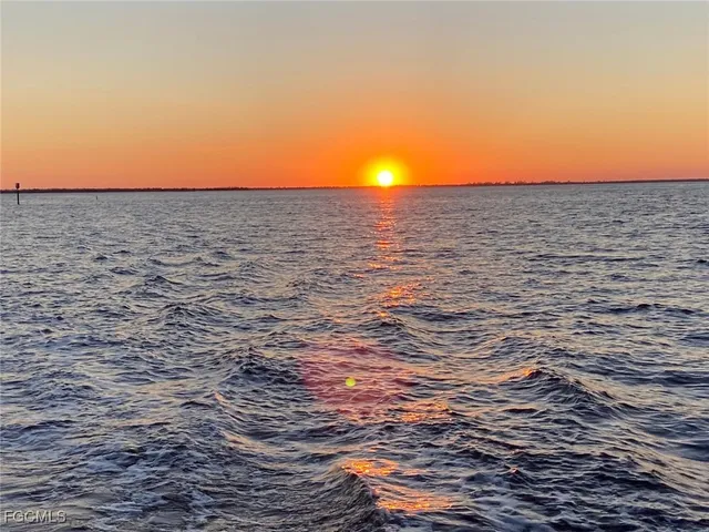 a group of people sitting in front of a building