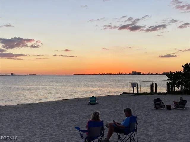 a picture of a book and a sign on a wall