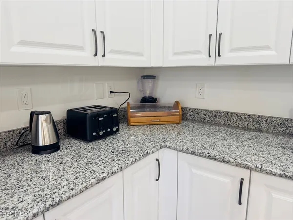 a view of a lake with building