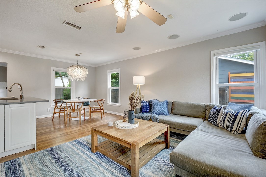 5800 Chesterfield Avenue Austin, TX 78752 - Photo 1 of 1 a living room with furniture and wooden floor