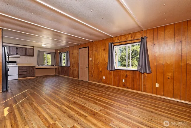 an empty room with closet area