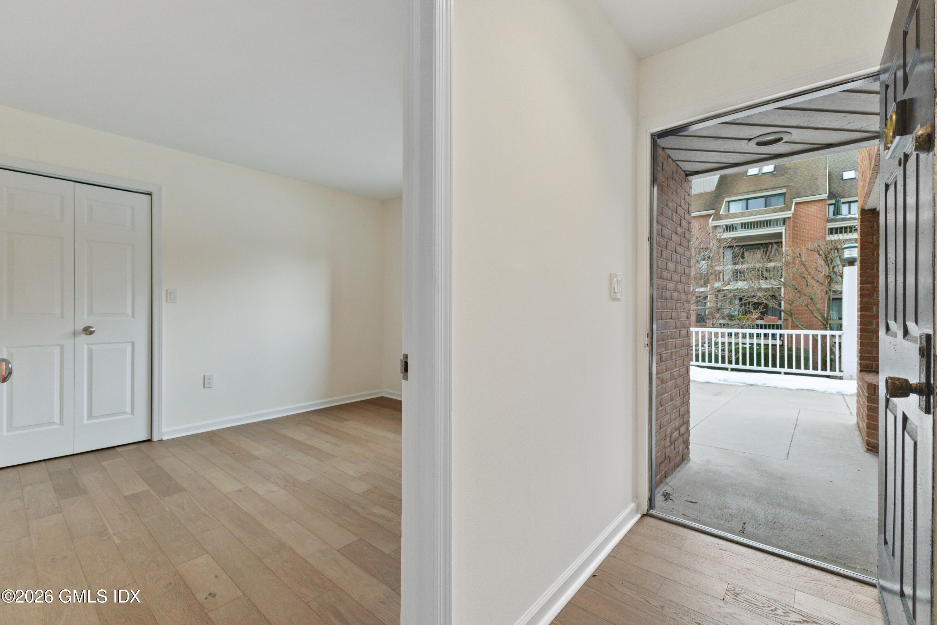 15 River Road, Unit 210 Cos Cob, CT 06807 - Photo 3 of 23 a view of entryway with wooden floor