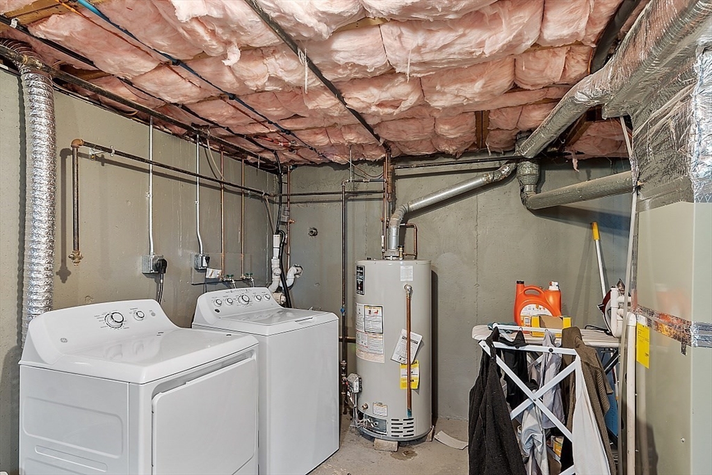 26 Pondover Road, Unit 26 Billerica, MA 01821 - Photo 17 of 23 a utility room with dryer and washer