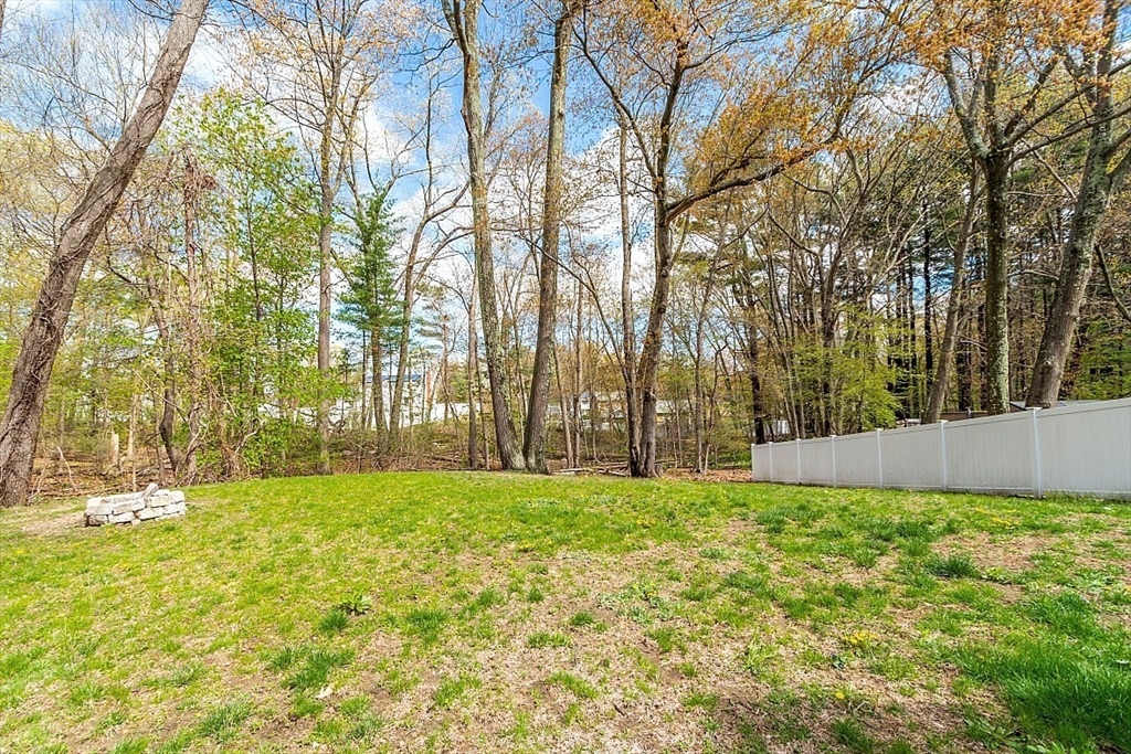 26 Pondover Road, Unit 26 Billerica, MA 01821 - Photo 22 of 23 a view of a yard with large trees