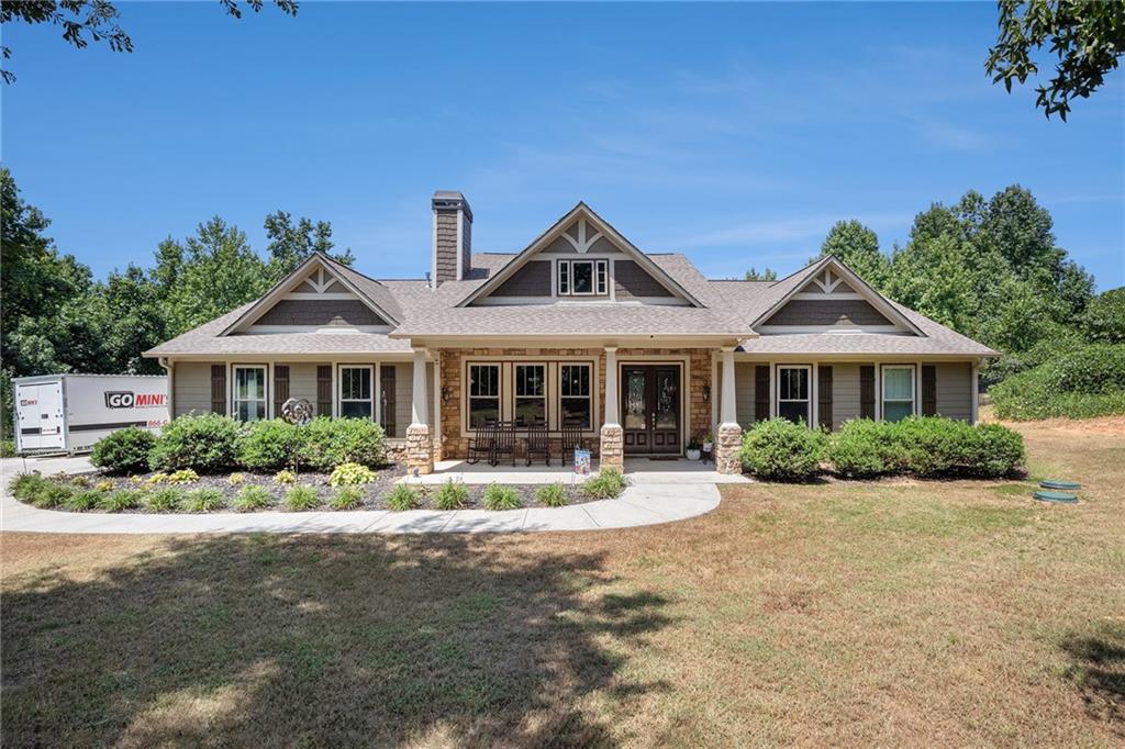 420 Sandhill Hulett Road Villa Rica, GA 30180 - Photo 1 of 1 a front view of a house with a yard