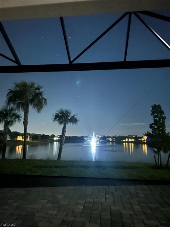 9195 Cayman Drive Naples, FL 34114 - Photo 17 of 29 a vase of flowers sitting on a table