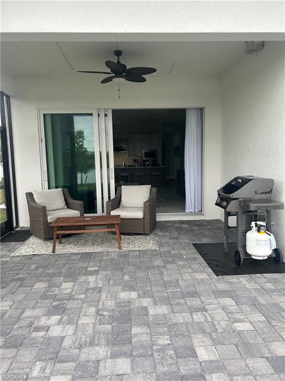 9195 Cayman Drive Naples, FL 34114 - Photo 18 of 29 a living room with furniture