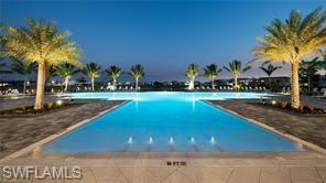 9195 Cayman Drive Naples, FL 34114 - Photo 25 of 29 a view of a park with palm trees