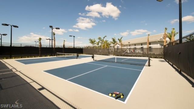 9195 Cayman Drive Naples, FL 34114 - Photo 29 of 29 a view of a tennis court