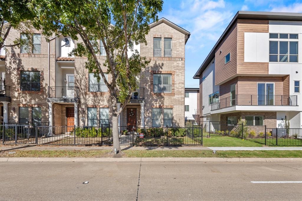 13900 Noel Road, Unit 23 Dallas, TX 75240 - Photo 3 of 28 a view of a street with a building in the background