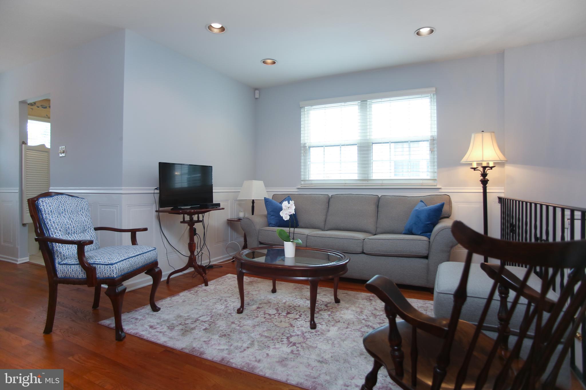 242 Springfield Avenue Philadelphia, PA 19118 - Photo 4 of 24 Bright sunny living room