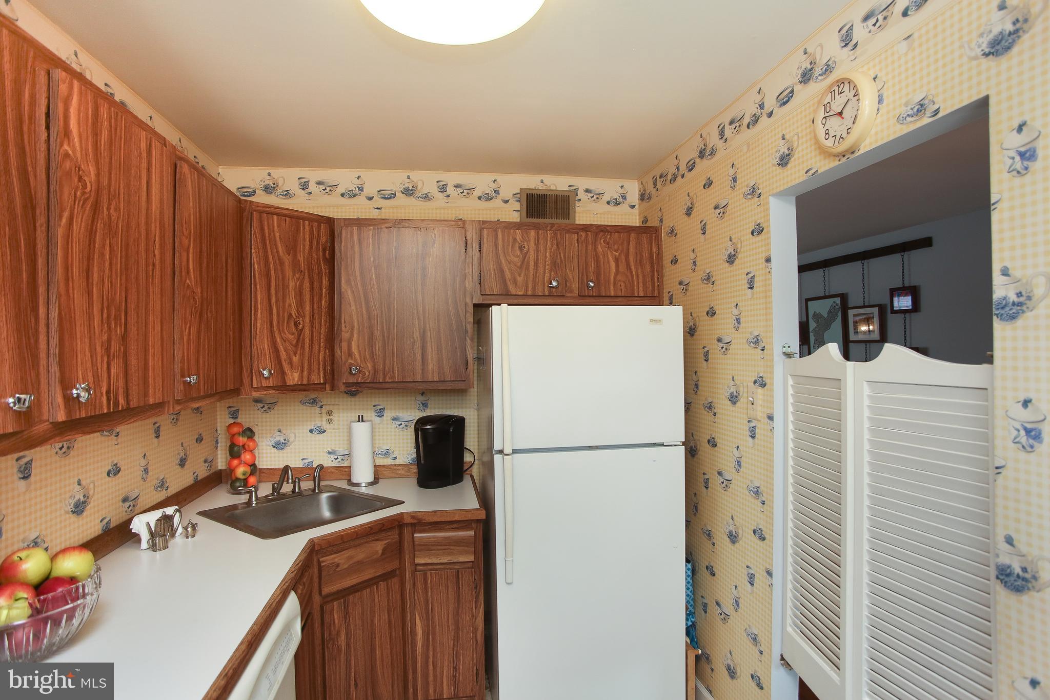 242 Springfield Avenue Philadelphia, PA 19118 - Photo 8 of 24 Kitchen walk through to dining