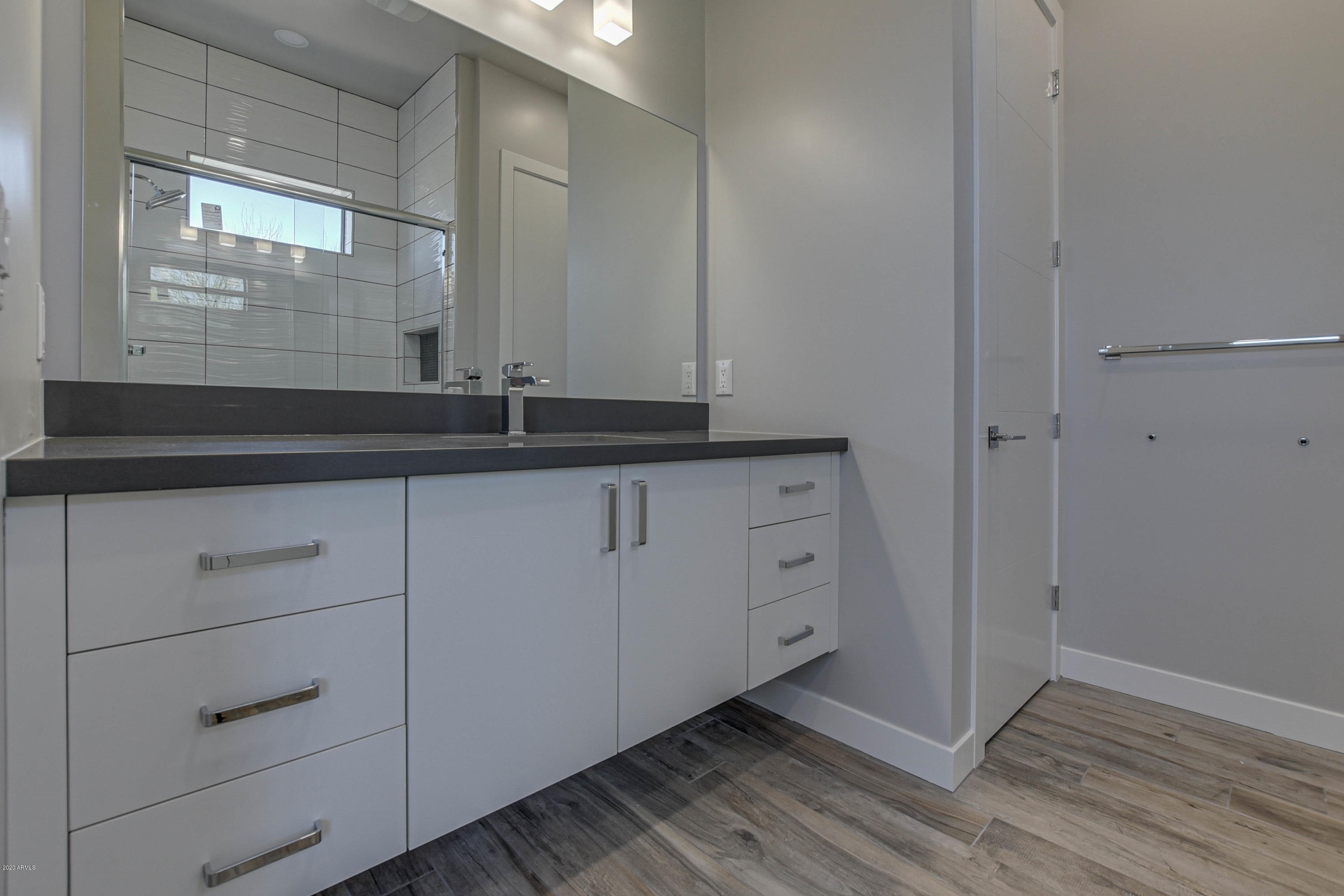 2645 East Osborn Road, Unit 6 Phoenix, AZ 85016 - Photo 28 of 43 a view of cabinets and wooden floor