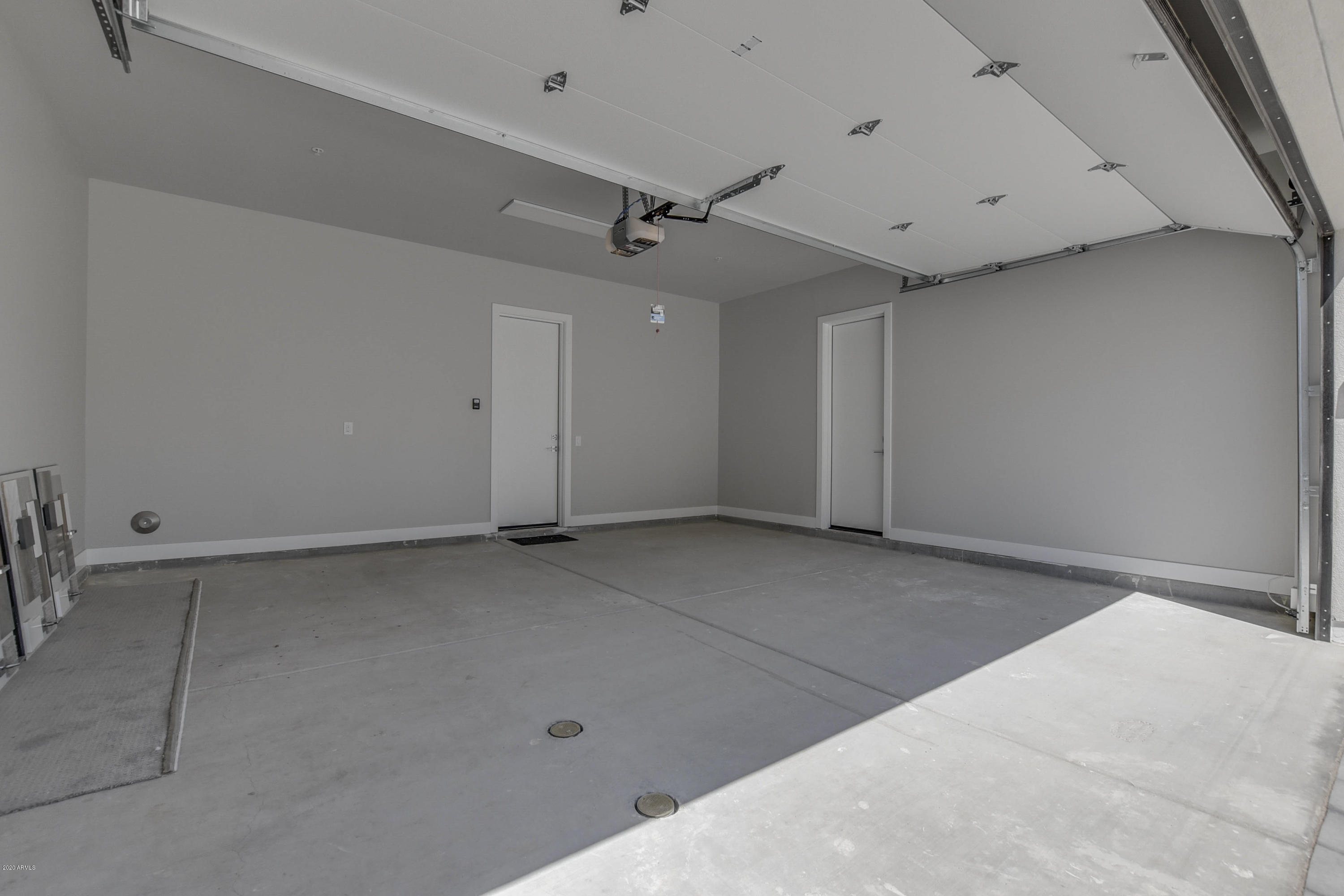 2645 East Osborn Road, Unit 6 Phoenix, AZ 85016 - Photo 33 of 43 an empty room with a ceiling fan and window